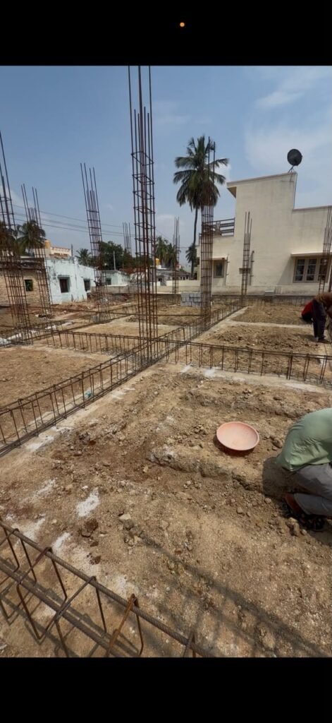 Plinth beam reinforcement being laid on site